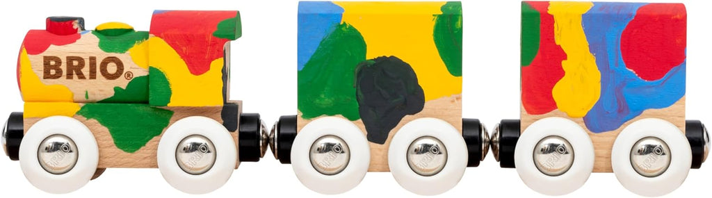 The BRIO World Paint Train includes three wooden cars with white wheels, each painted in bold red, yellow, green, blue, and black. The first car displays "BRIO." on its side—ideal for expanding your BRIO World collection.