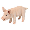 The Pig Stuffed Animal features light pink fur and stands on all four legs against a white background. Hand sewn with lifelike details, it’s part of the HANSA animals collection for a true-to-nature look.