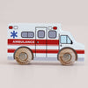 No. 43 GT265 Lance | Made in England — a wooden toy ambulance featuring red and white stripes, a blue medical star symbol, and wooden wheels on a plain background—perfect for imaginative play and exciting rescue stories.