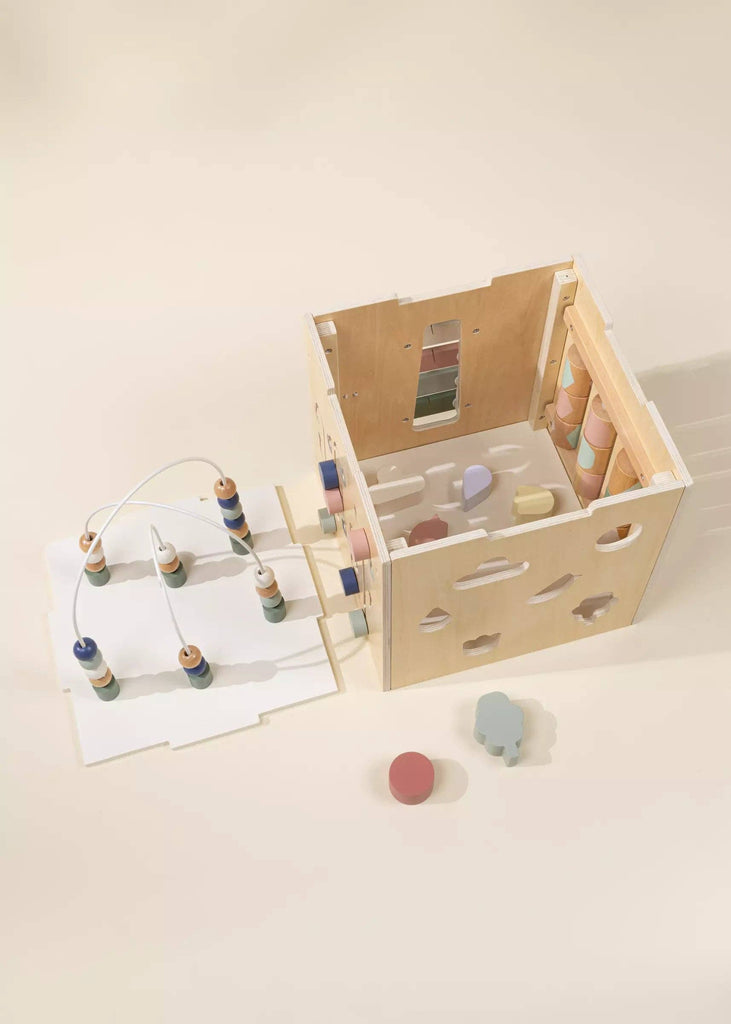 The Wooden Activity Cube features a pastel bead maze and shape sorter to help toddlers develop fine motor skills. Kids can match various shapes to the cube's holes and enjoy colorful pieces for interactive, hands-on play.