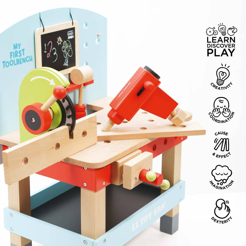 The Wooden Tool Bench is a colorful playset with a mini saw, drill, and power tools, ideal for pretend play. Icons show it encourages children's creativity, coordination, imagination, cause & effect learning, and dexterity.