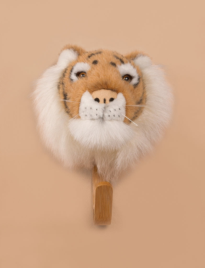 The Coat Hanger - Tiger features a plush tiger head with soft fur and whiskers, mounted on a light wooden plaque, making a fun and playful addition to your space.