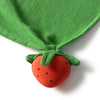 Sweetie the Strawberry Big Doudou is an organic cotton baby comforter featuring a red strawberry shape with black dots and green fabric leaves, designed for gentle teething relief and cuddly comfort.