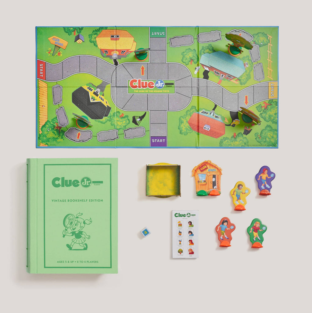 The Clue Jr. Vintage Bookshelf Edition includes a vintage-style green storage box, a folded game board with a suburban neighborhood map, four character playing pieces, a die, and a deck of cards.