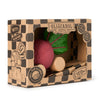A boxed "Betty The Beetroot Baby Car" toy set, made from natural rubber and FSC-certified wood with green leaves and wooden wheels, is eco-friendly and safe for babies aged 0+.