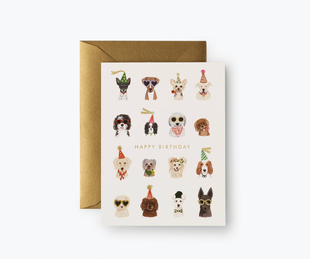The Party Pups Birthday Card features illustrated dogs in party hats above gold foil "Happy Birthday" text. Paired with a gold envelope, the card has a blank interior for your personal message.