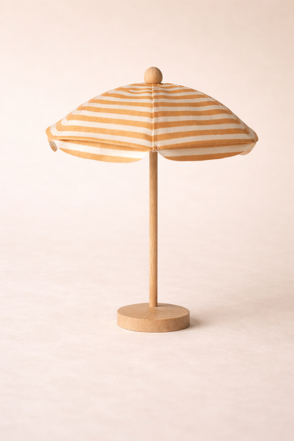 The Maileg Beach Umbrella, Mouse - Soft Coral (ships in one week) stands upright on a neutral background—perfect for imagining a mouse family enjoying a sunny day by the shore.