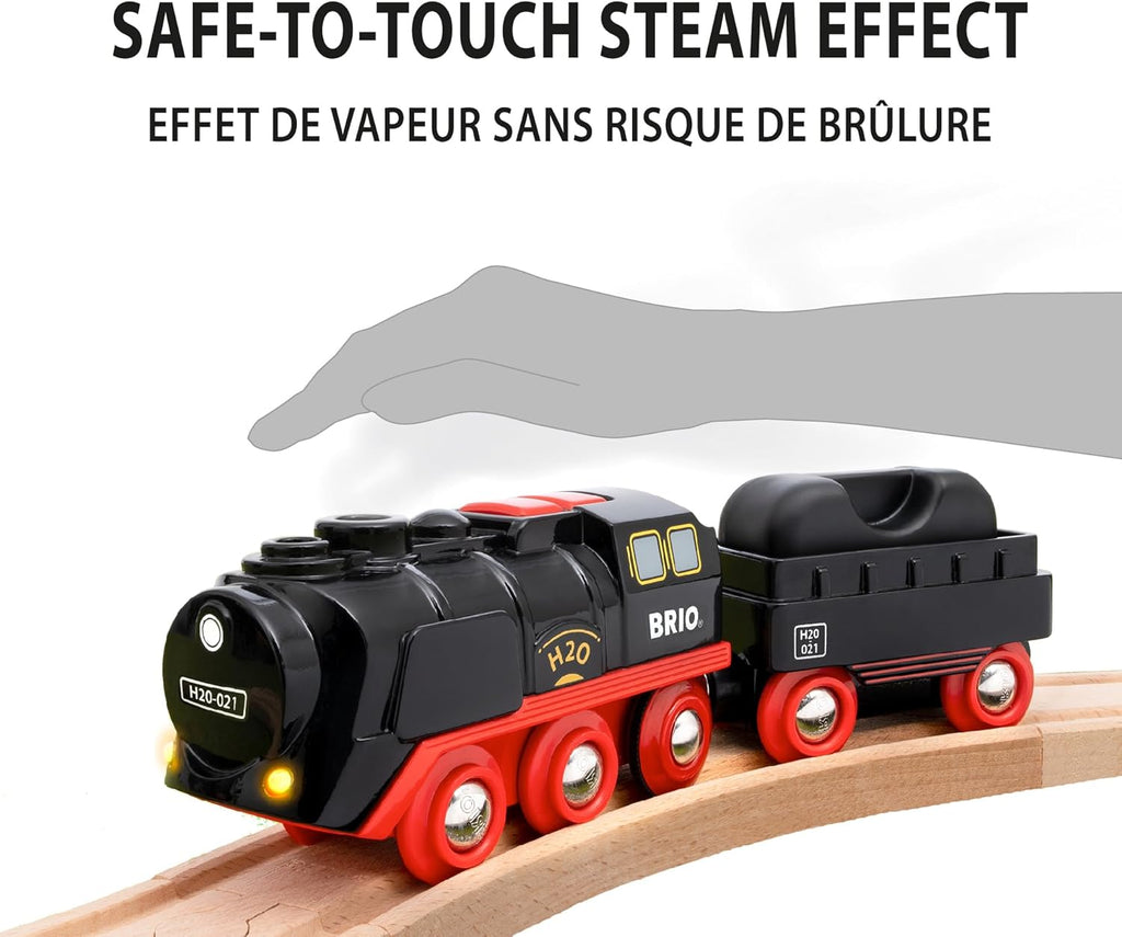 The BRIO World Christmas Steaming Train Set, shown on a curved wooden track, features a safe-to-touch steam effect with a gray hand above and "SAFE-TO-TOUCH STEAM EFFECT" text in English and French.
