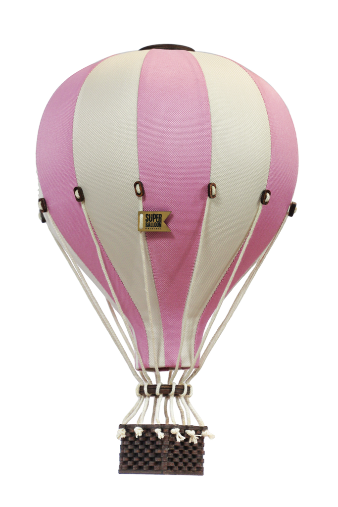 The Hot Air Balloon - Powder Pink features alternating pink and white stripes with a small woven basket below, creating a charming handmade decor piece for children's rooms, displayed against a white background.