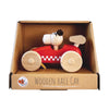 A delightful Egmont Toys creation, the Wooden Race Car Toy with Dog Driver features natural wood wheels and a red body accented by a checkered stripe, attractively presented in a cardboard box labeled "Wooden Race Car.