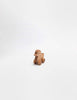 The Sabo Concept Rolling Duck - Natural is a small wooden toy duck on wheels, crafted from natural materials and displayed against a plain white background.