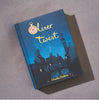 The Oliver Twist | Dickens | Collector's Edition | Hardcover Book features a dark blue cover with a Victorian-era town illustration and a pink pocket watch at the top left.