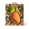 The Cathy the Carrot Plate & Spoon Set by Oli & Carol comes in a carrot-shaped box and includes a non-toxic orange silicone plate with a green top and a matching spoon, suitable for babies 6 months and up. This adorable dinnerware set is perfect for little ones beginning their solids journey.
