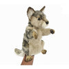 A realistic Wolf Puppet with tan, gray, and white fur is shown upright on a person's hand against a plain white background.