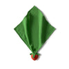 Sweetie the Strawberry Big Doudou, a green organic cotton napkin, is folded into a diamond shape with a red strawberry detail at the bottom corner, set against a white background.