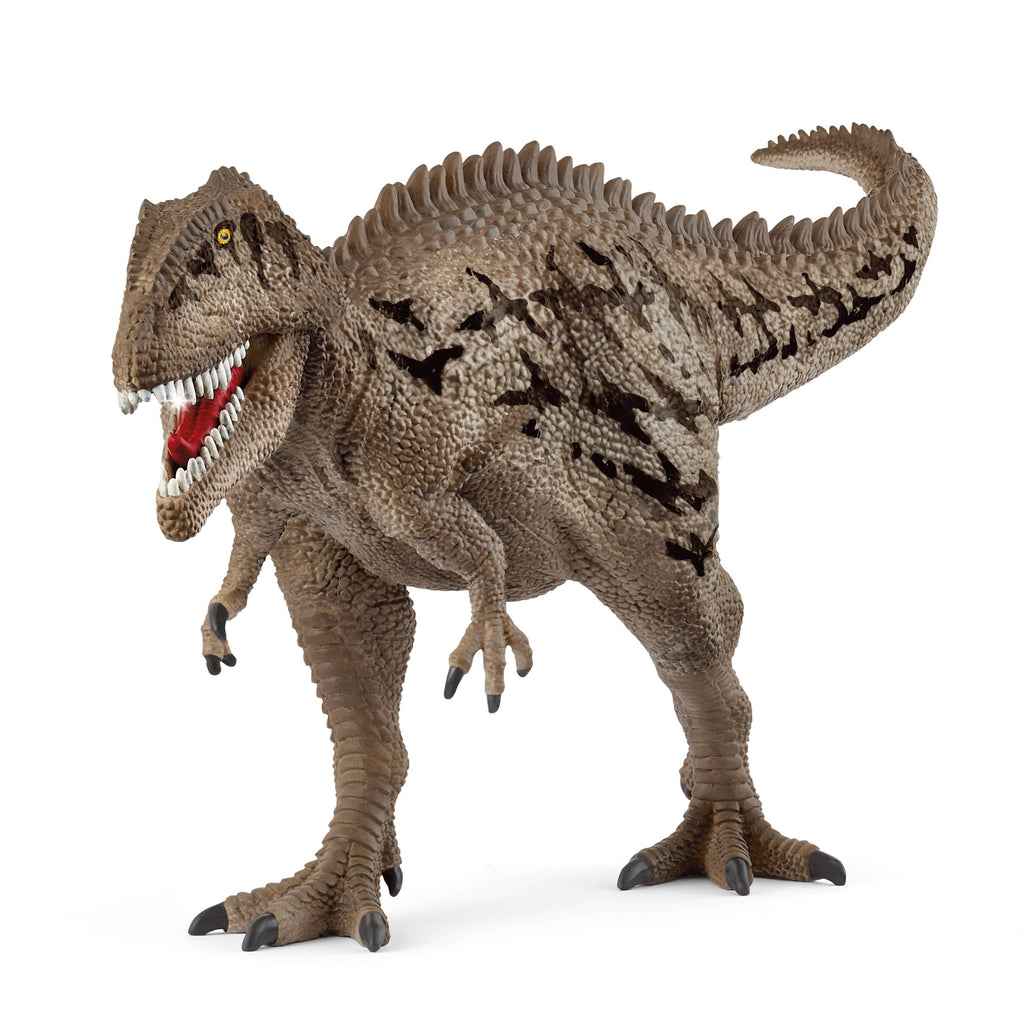 The Schleich Carcharodontosaurus Dinosaur Toy is a highly detailed model featuring a brown and gray, fierce-looking theropod with an open mouth, sharp teeth, and short arms, standing on two legs against a white background—perfect for collectors.