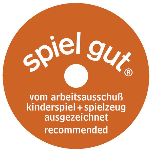 Rust-colored circular badge with white "spiel gut" text at top and "vom arbeitsausschuß kinderspiel + spielzeug ausgezeichnet recommended" below a central hole, often seen on handcrafted HOLZTIGER Squirrel, brown figure made from maple and beech wood.