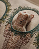 A close-up of the Christmas Wreath Trio Pocket Pillow: its fabric features a 3D embroidered bear head, plush and raised, framed by an embroidered leafy wreath that evokes woodland friends and festive holiday decor.