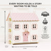 Sophie's Wooden Dolls House is a pastel pink, FSC-certified toy made from sustainable wood. Plastic-free, it features shutters and a door, and measures 670mm tall, 610mm wide, and 350mm deep. It stands against a light wall.