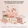 Retro Wooden Doll Stroller displayed with a wooden high chair, doll cot, toy bottle, and bag set, under text reading: “EXPLORE THE COMPLETE RANGE OF WOODEN DOLL PLAY SETS.”