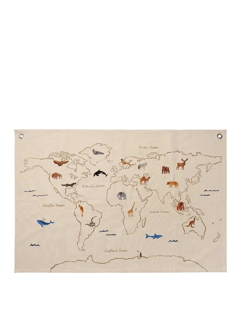 The Ferm Living The World Textile Map - Off-white is an organic cotton wall decoration featuring embroidered animals on their native continents and labeled major oceans. Whales, bears, elephants, and tigers are shown in appropriate regions.