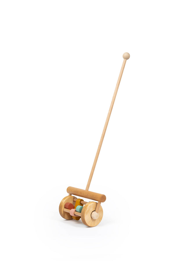 The Handmade Wooden Toy, Push Toy Rattle, is crafted from natural materials with a long handle and wheels containing colorful beads—perfect for young children to push along the floor.