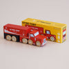 A red wooden truck labeled “No. 33 GT180 Toby | Made in England” is placed in front of its yellow box packaging, which features an illustration of the toy. This vintage-inspired design encourages imaginative storytelling for endless playtime adventures.