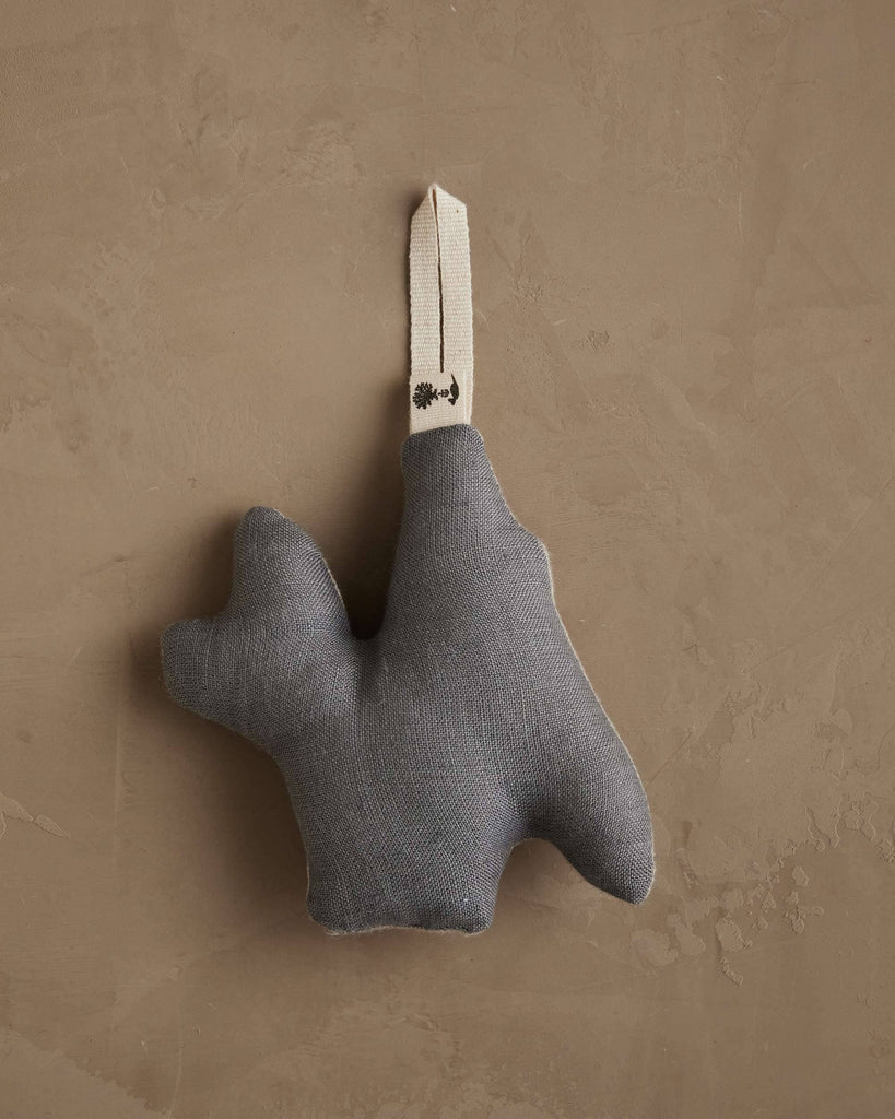 Coral & Tusk Red Cardinal Ornament in the shape of a plush, grey dog crafted from natural linen with a cream-colored fabric hanging loop.