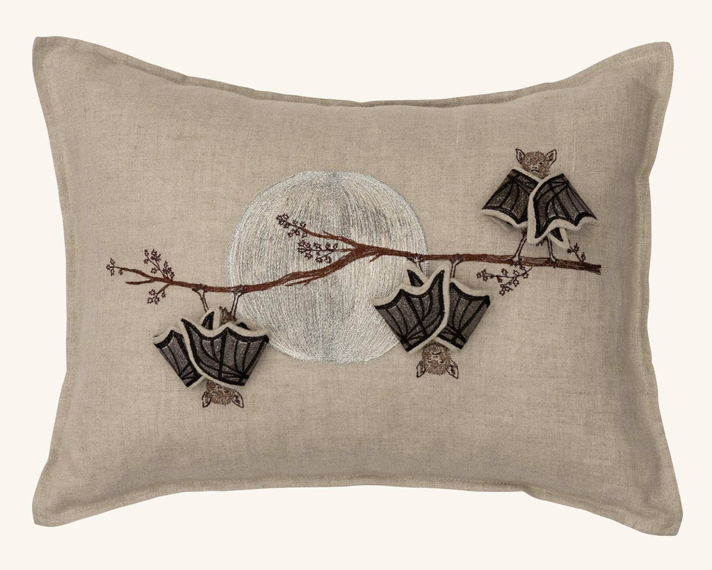 The Coral & Tusk Bat Branch Pillow features a beige rectangular design with a silver moon, brown branch, and baby bats—perfect for your Halloween display. Ships in one week.