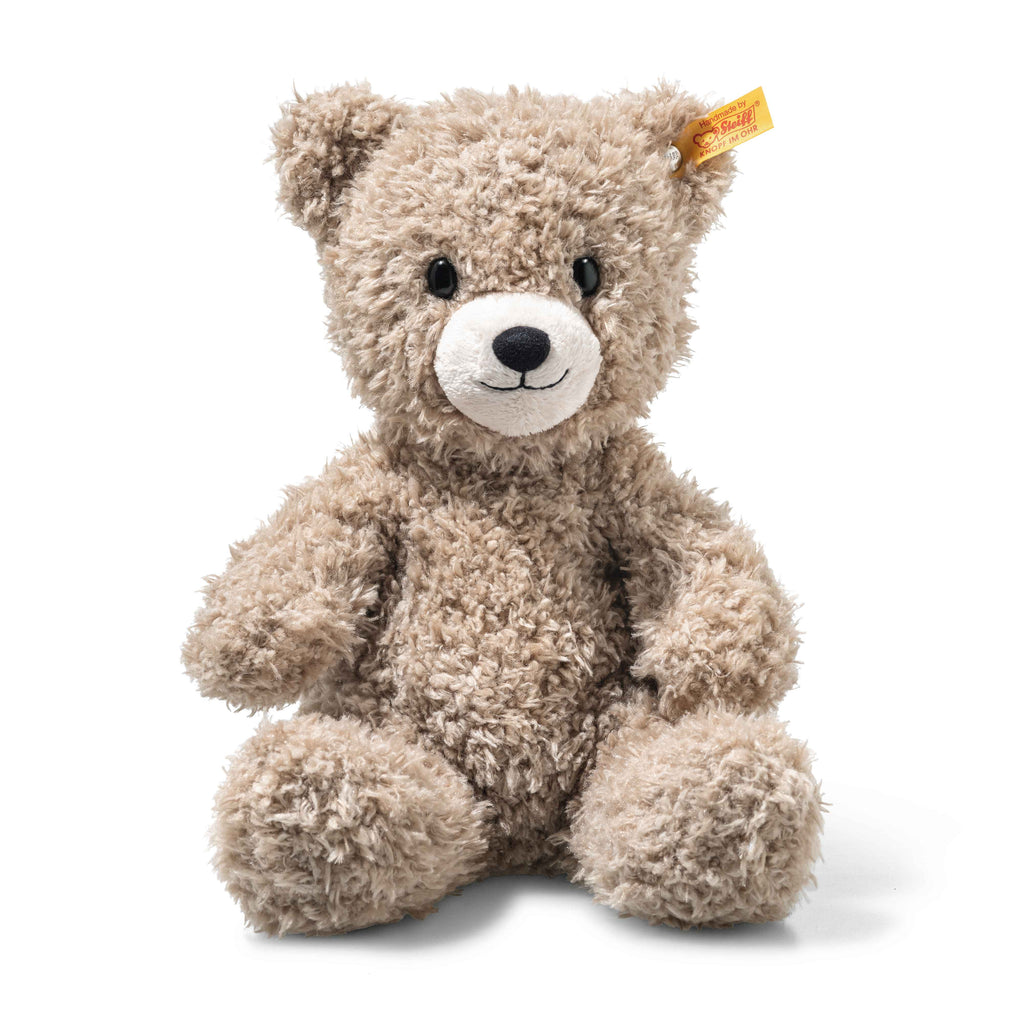 The Light at Night Caspar Teddy Bear Stuffed Plush, 11 inches, is a fluffy light brown bear with a yellow ear tag that serves as a charming night light. It sits upright with black eyes, a black nose, and a small smile against a plain white background.