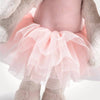 Close-up of the Steiff Hoppie Rabbit Ballet, featuring soft fabric arms and legs with a fluffy texture, dressed in a delicate light pink tutu—perfect for little ballerina fans.
