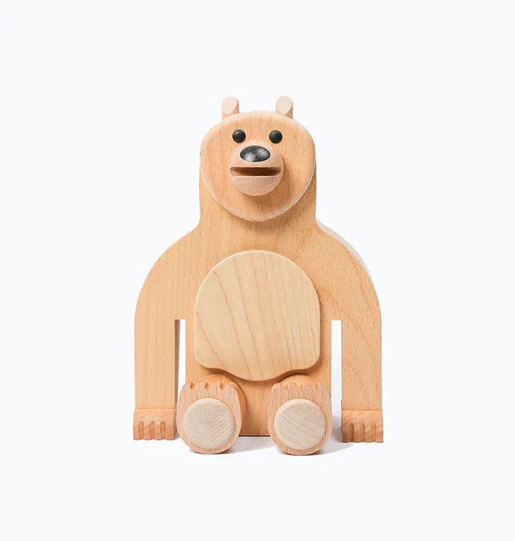 A Wooden Big Bear Bookend with a friendly expression, sitting upright, made of responsibly-sourced, solid wood with visible grain, featuring cut-out details for arms, legs, and a circular stomach.