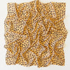 Sarah's Silks Animal Print Playsilk - Cheetah features a square yellow fabric with black and brown cheetah spots, softly folded—ideal for imaginative Waldorf toys play.