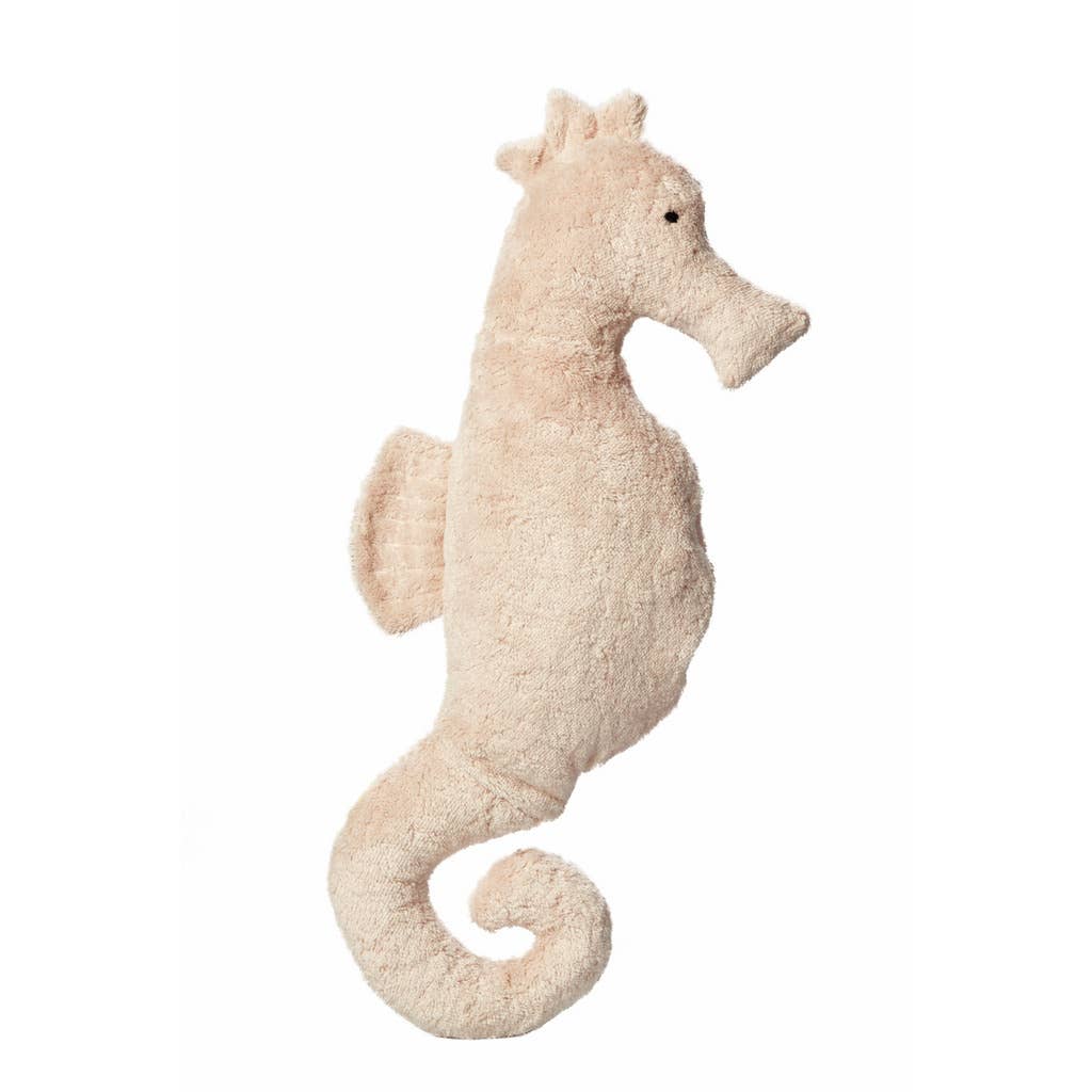The Senger Naturwelt Cuddly Animal - Seahorse is a plush, light beige toy with a curled tail, small back fin, stitched eye, and a grain pillow for comfort, shown on a plain white background.