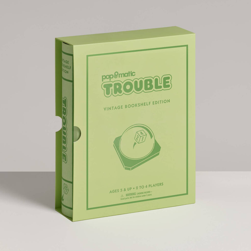 A green box styled like a book, "Board Game: Trouble Vintage Bookshelf Edition" showcases the iconic Pop-O-Matic die roller and classic 1986 vintage game board design.