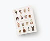 The Party Pups Birthday Card features illustrated dogs in hats, sunglasses, and accessories in a grid above “Happy Birthday” in metallic gold foil on a white background. The card is blank inside for your personal message.