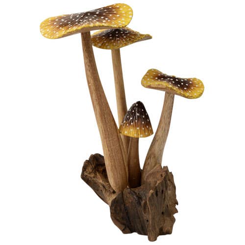 The Small Wooden Natural Mushroom Trio features three realistic wooden mushrooms with brown and yellow spotted caps, artfully arranged on a textured, dark driftwood base. This decorative figurine displays mushrooms of varying heights and sizes, bringing a charming touch to any display.