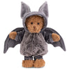 Bukowski - Bear In Bat Costume stands upright against a white background, featuring a charming brown teddy bear dressed in a plush gray bat costume with large wings and tall pointed ears—perfect for cozy nighttime cuddles.