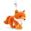Introducing the Bukowski - Clever Fox Bag Charm: a delightful plush toy fox keychain featuring vibrant orange fur, a soft white chest, black-tipped ears, and a silver clip attached to its back. Standing on all four legs, this charming woodland accessory is the perfect mini fox companion for your favorite bag!.