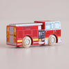 A small wooden fire engine toy—No. 44 GT270 Quinn, made in England—painted red with yellow and white details and labeled “FIRE DEPT” and “ENGINE CO.6,” sits on a light surface. Perfect for imaginative adventures, its wooden wheels bear the printed name “LeftyVan” and are ready to roll into playful rescue missions.