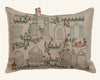 The Coral & Tusk Graveyard Pocket Pillow (ships in one week) is beige and features embroidered gravestones, pumpkins, vines, flowers, fences, and a gray rabbit peeking from a tomb with a "GRIM GRINNING" scroll.