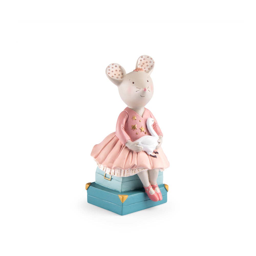 The Moulin Roty Money Box - The Little School of Dance features a hand-drawn mouse in a pink dress with stars, sitting on blue suitcases and holding a white goose—perfect as charming children's bedroom decor.