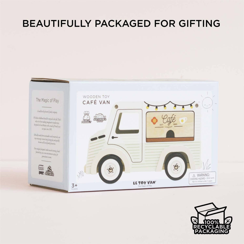 A boxed Mobile Café Van, crafted from FSC-certified wood, is displayed against a light background. The packaging highlights its gift-ready design and 100% recyclable materials, featuring playful illustrations to inspire imaginative play.
