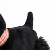 A close-up of Pull-Along Walter—a black plush dog with an upright tail, featuring a red and white checkered collar and sturdy wooden wheels—set against a plain white background. This charming toy is perfect for encouraging gross motor skills.