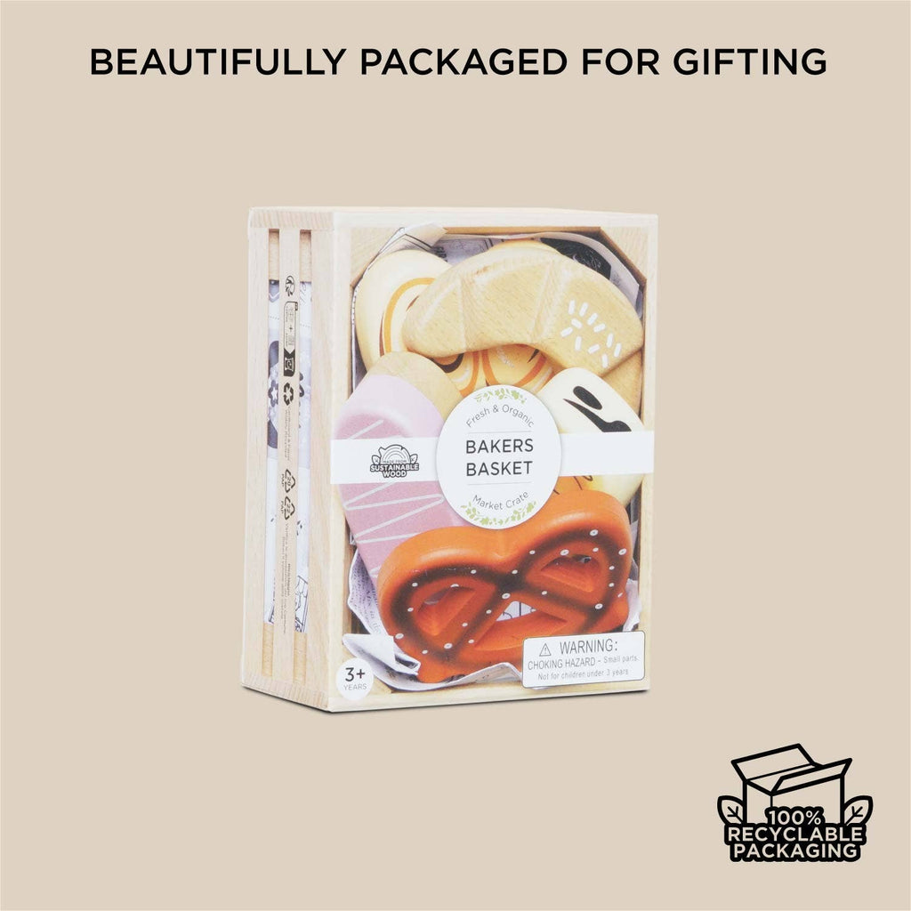 The "Bakery & Patisserie Wooden Market Crate," a set of wooden toy baked goods in a wooden crate, is shown against a beige background with "Beautifully Packaged for Gifting" and a "100% Recyclable Packaging" icon.
