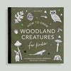 Book cover titled "Mushrooms & Woodland Creatures: A Kids Drawing Book," featuring an owl, rabbit, mushrooms, snail, butterfly, and leaves on a green background—ideal for beginner artists or homeschool art lessons.