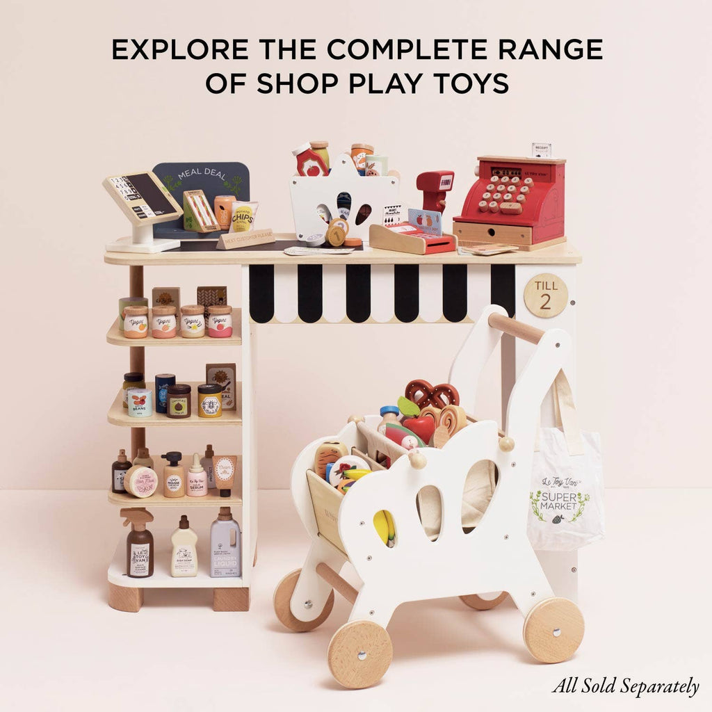 The Groceries Set & Scanner features a market stand with toy groceries, a red cash register, chalkboard, and shopping cart of play food—all made from FSC-certified wood. Explore the full range of pretend shopping toys!.