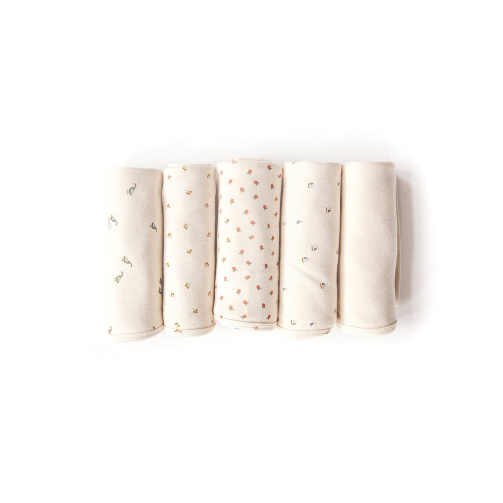 Five cream-colored Organic Baby Blanket – Gold Sprig, made from GOTS-certified organic cotton with subtle animal, dot, and plant patterns in soft colors—an ideal baby product displayed neatly on a white background.