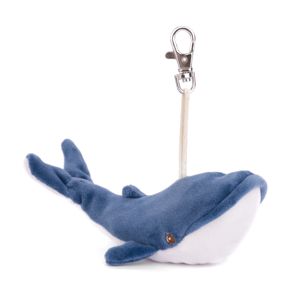 Introducing the Bukowski - Bubbles Whale Bag Charm: a soft and cuddly blue and white plush whale keychain featuring a simple design with a small eye, silver clip, and short string. This adorable bag accessory is perfect for ocean lovers looking for the cutest mini bag charm.