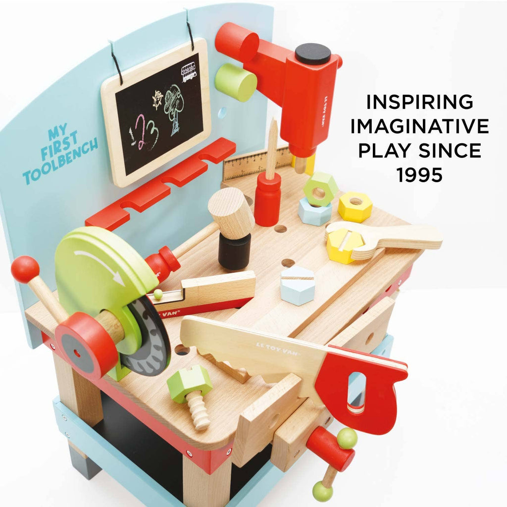The Wooden Tool Bench is a colorful playset with tools like a saw, hammer, wrench, and screws, plus a chalkboard. Perfect for pretend play. Text: "INSPIRING IMAGINATIVE PLAY SINCE 1995.
